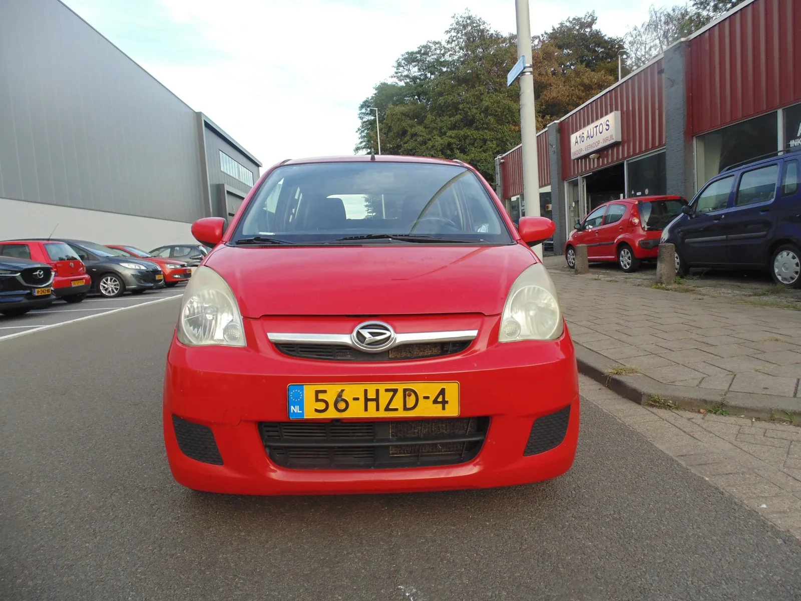 Daihatsu Cuore (2009) — foto 1