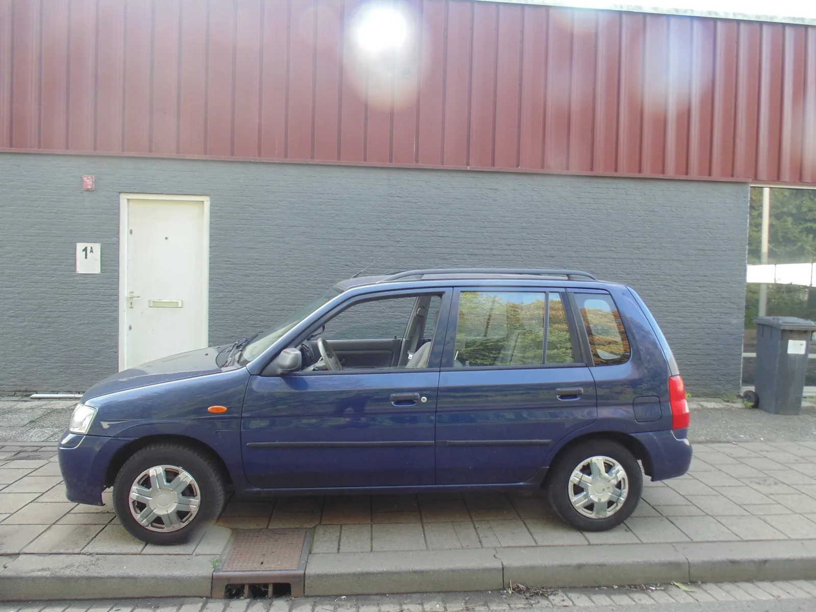 Mazda Demio (2002) — foto 1