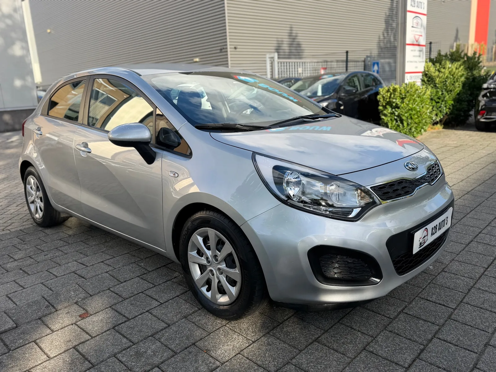 Kia Rio (2014) — foto 1
