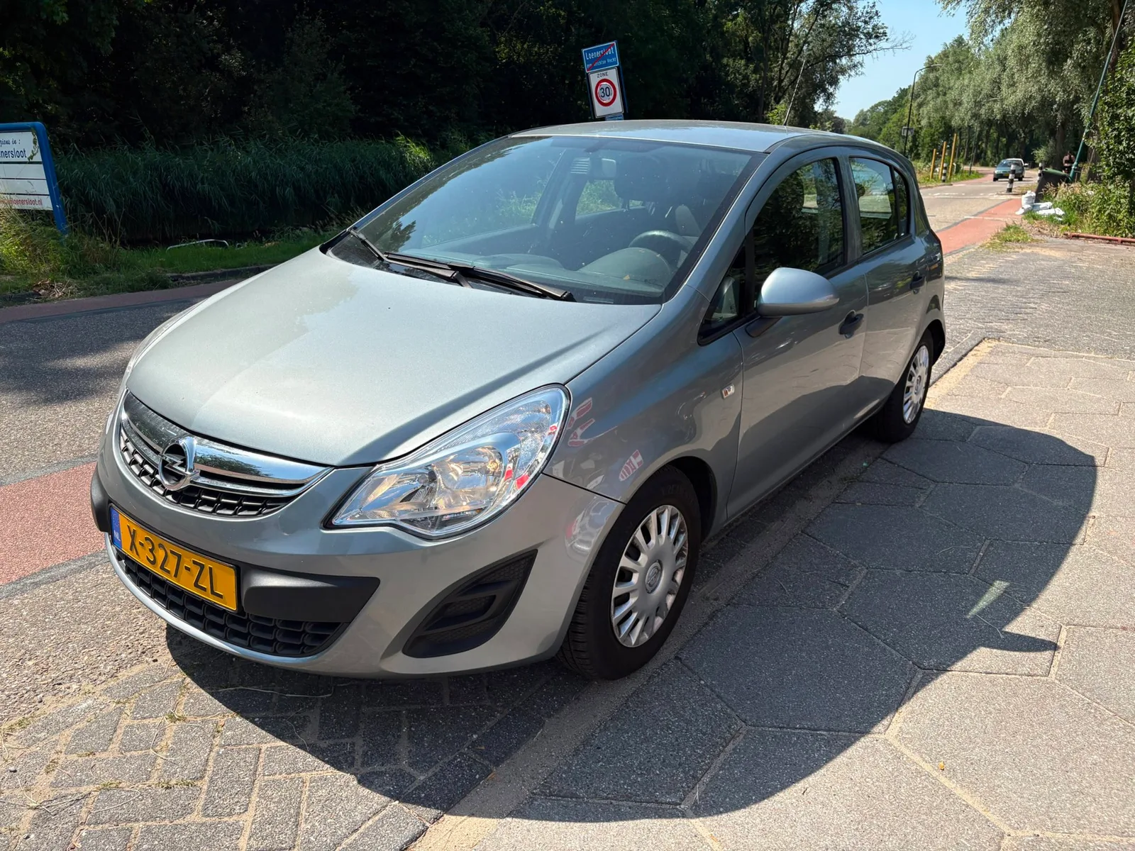 Opel Corsa (2011) — foto 1