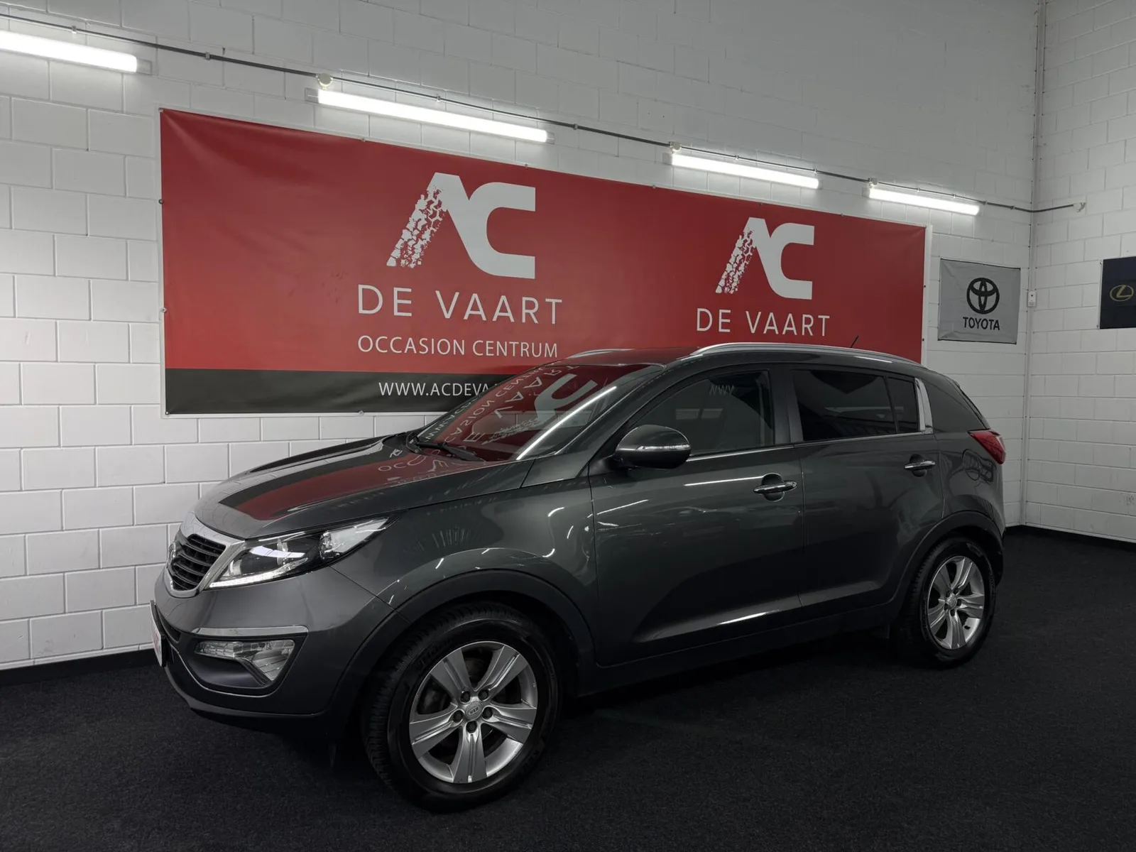 Kia Sportage (2011) — foto 1