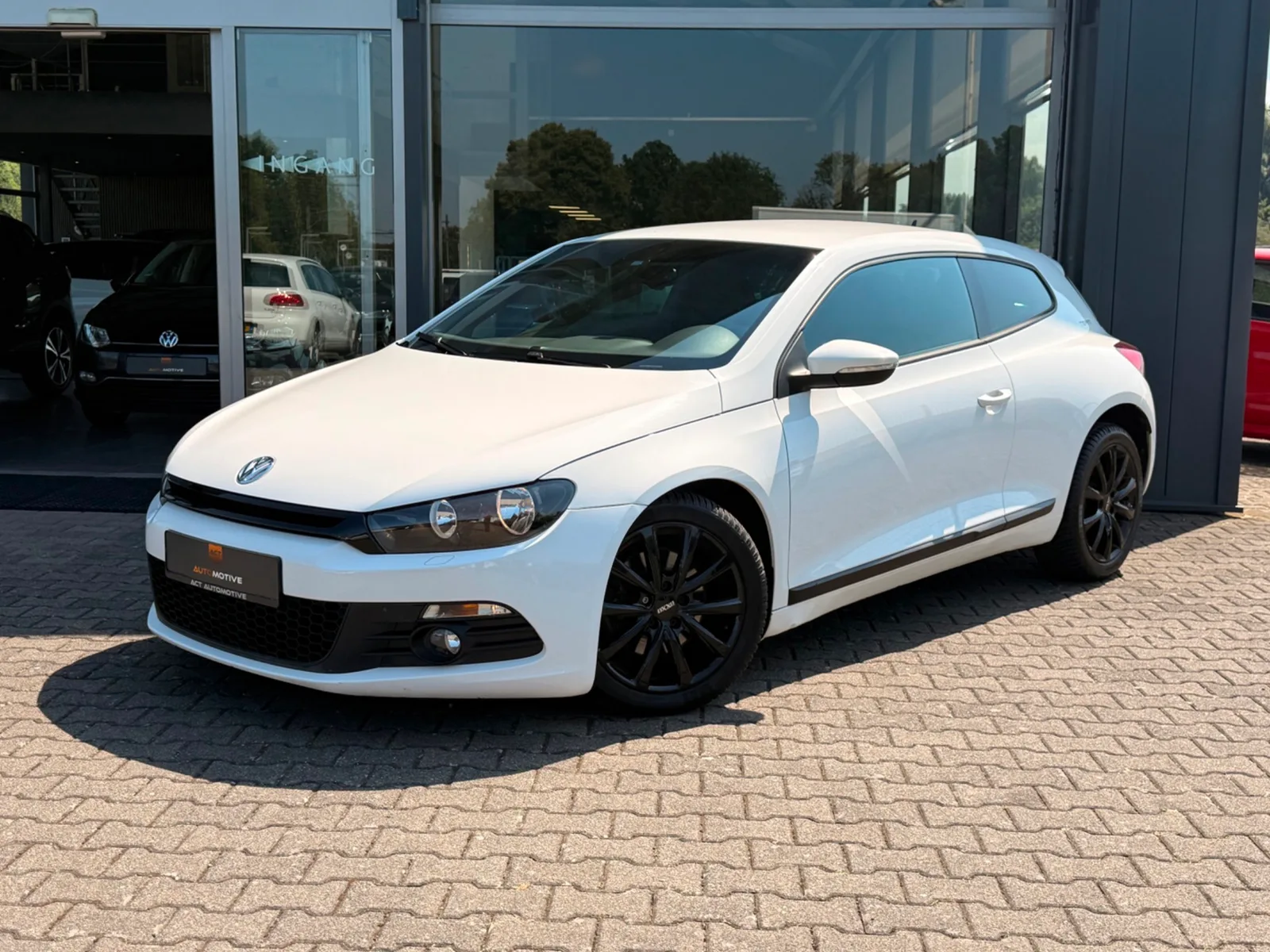 Volkswagen SCIROCCO (2010) — foto 1