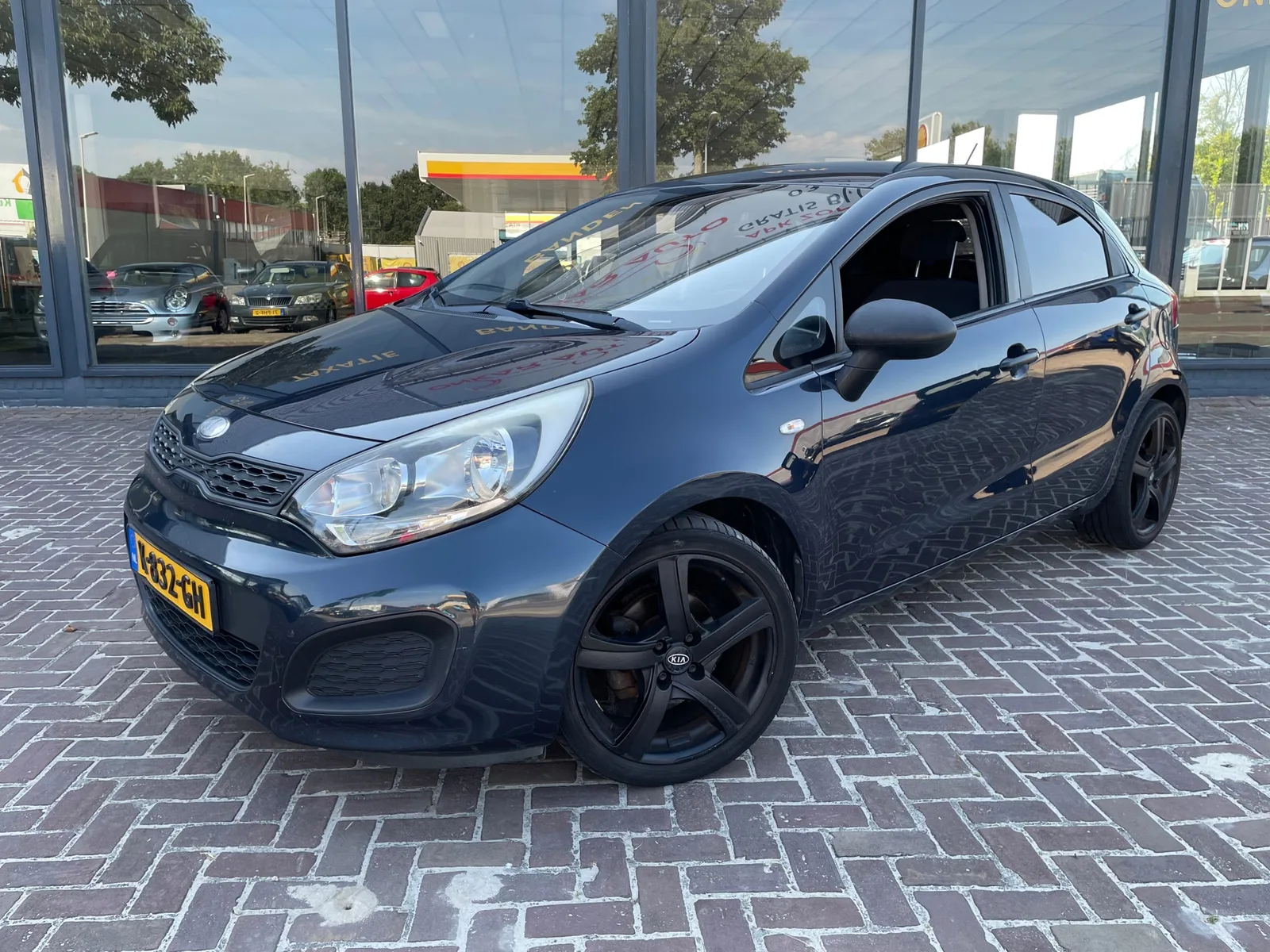 Kia Rio (2013) — foto 1