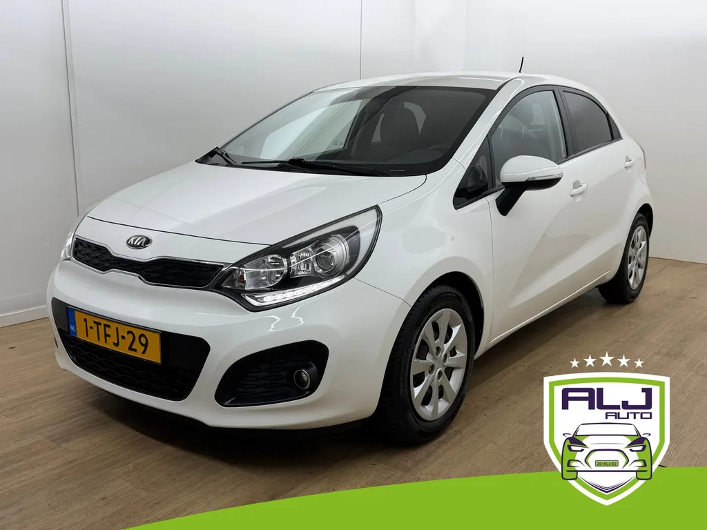 Kia Rio (2014) — foto 1