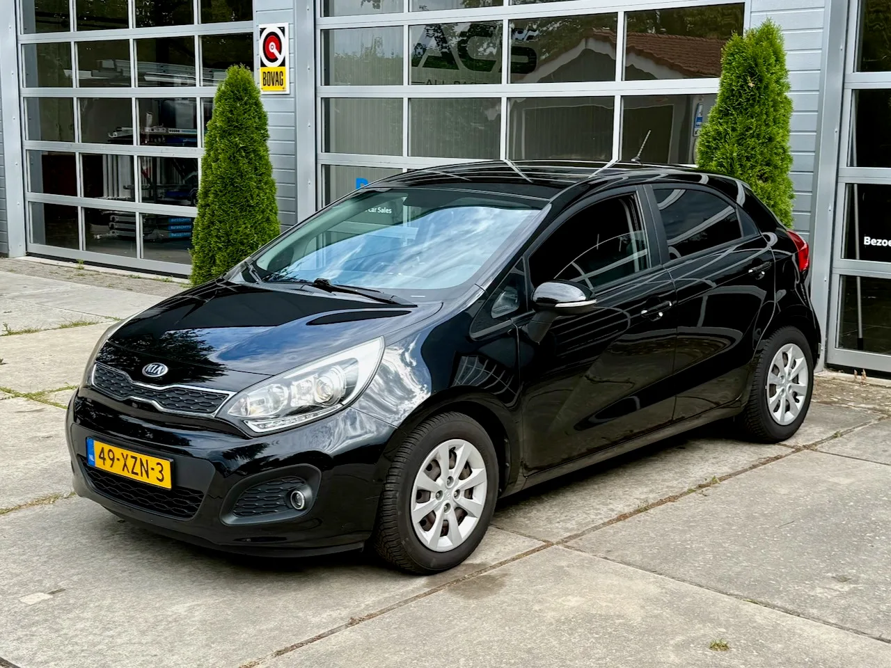 Kia Rio (2012) — foto 1