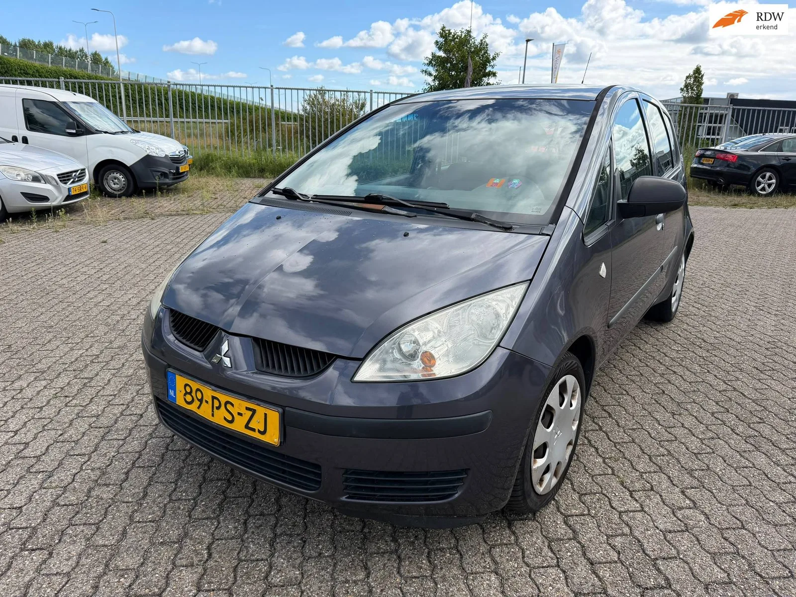Mitsubishi Colt (2004) — foto 1