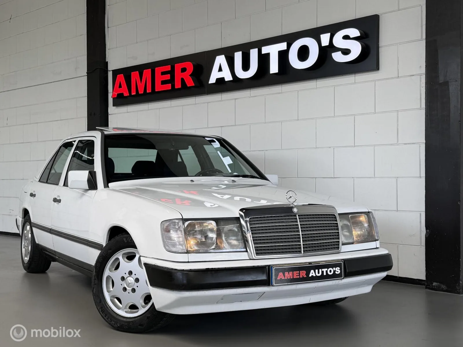 Mercedes-Benz 200-Serie (1985) — foto 1