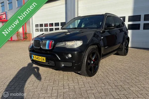 BMW X5 (2009) — foto 1