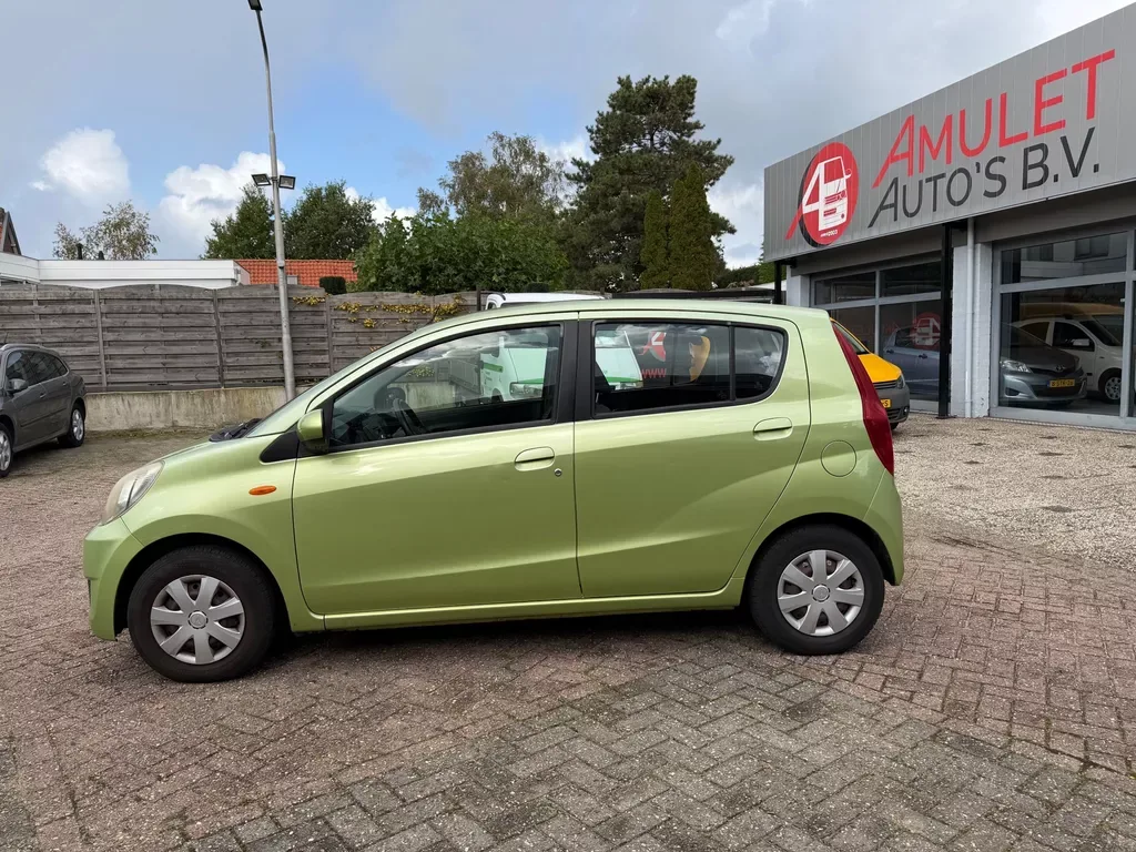 Daihatsu Cuore (2008) — foto 1