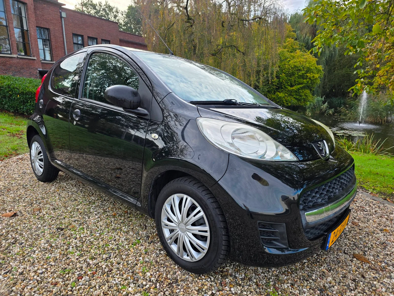 Peugeot 107 (2011) — foto 1
