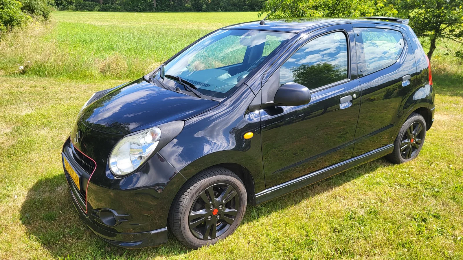 Suzuki Alto (2011) — foto 1