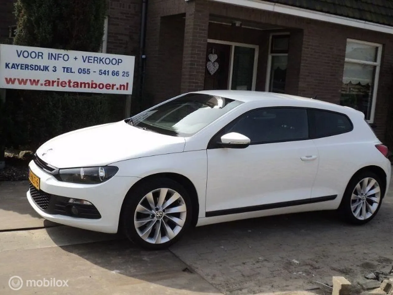 Volkswagen Scirocco (2010) — foto 1