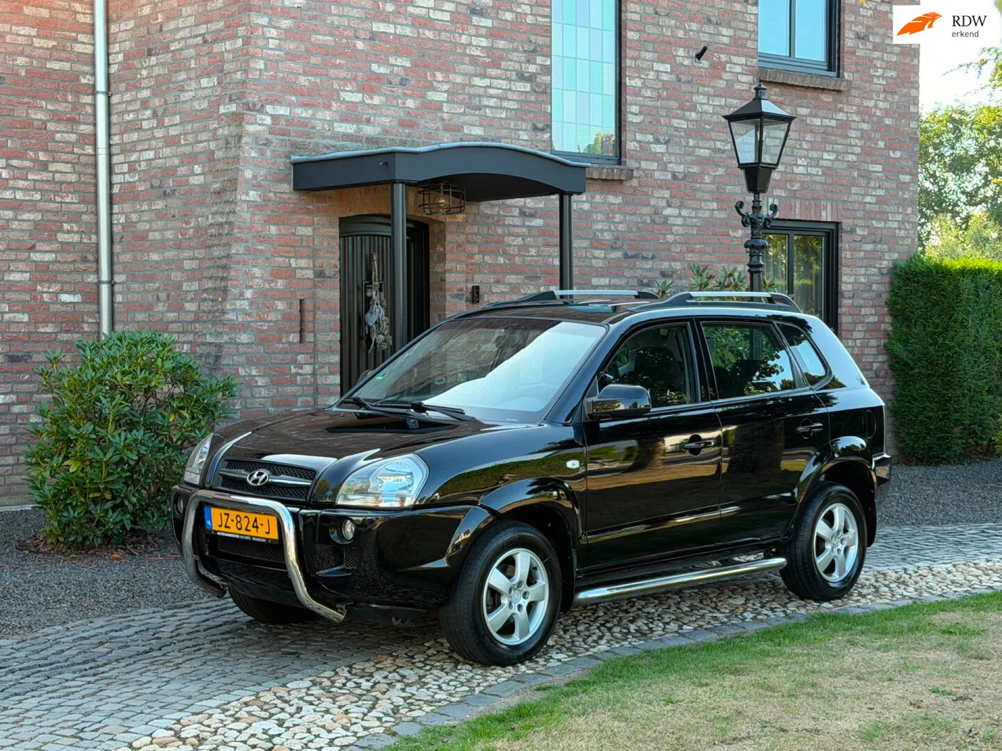 Hyundai Tucson (2009) — foto 1