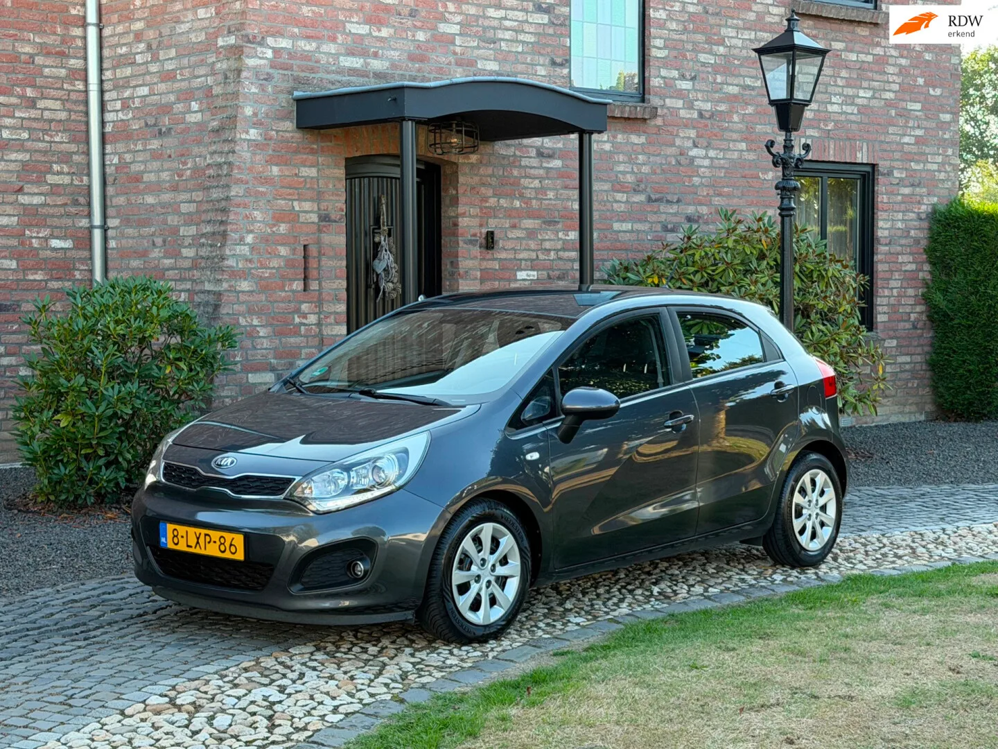 Kia Rio (2014) — foto 1