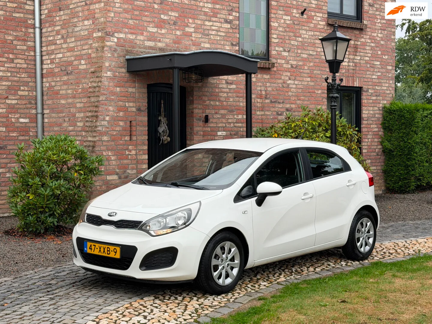 Kia Rio (2012) — foto 1