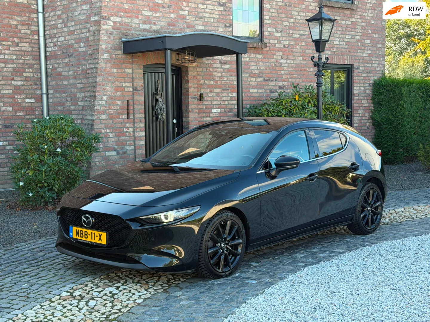 Mazda 3 (2021) — foto 1