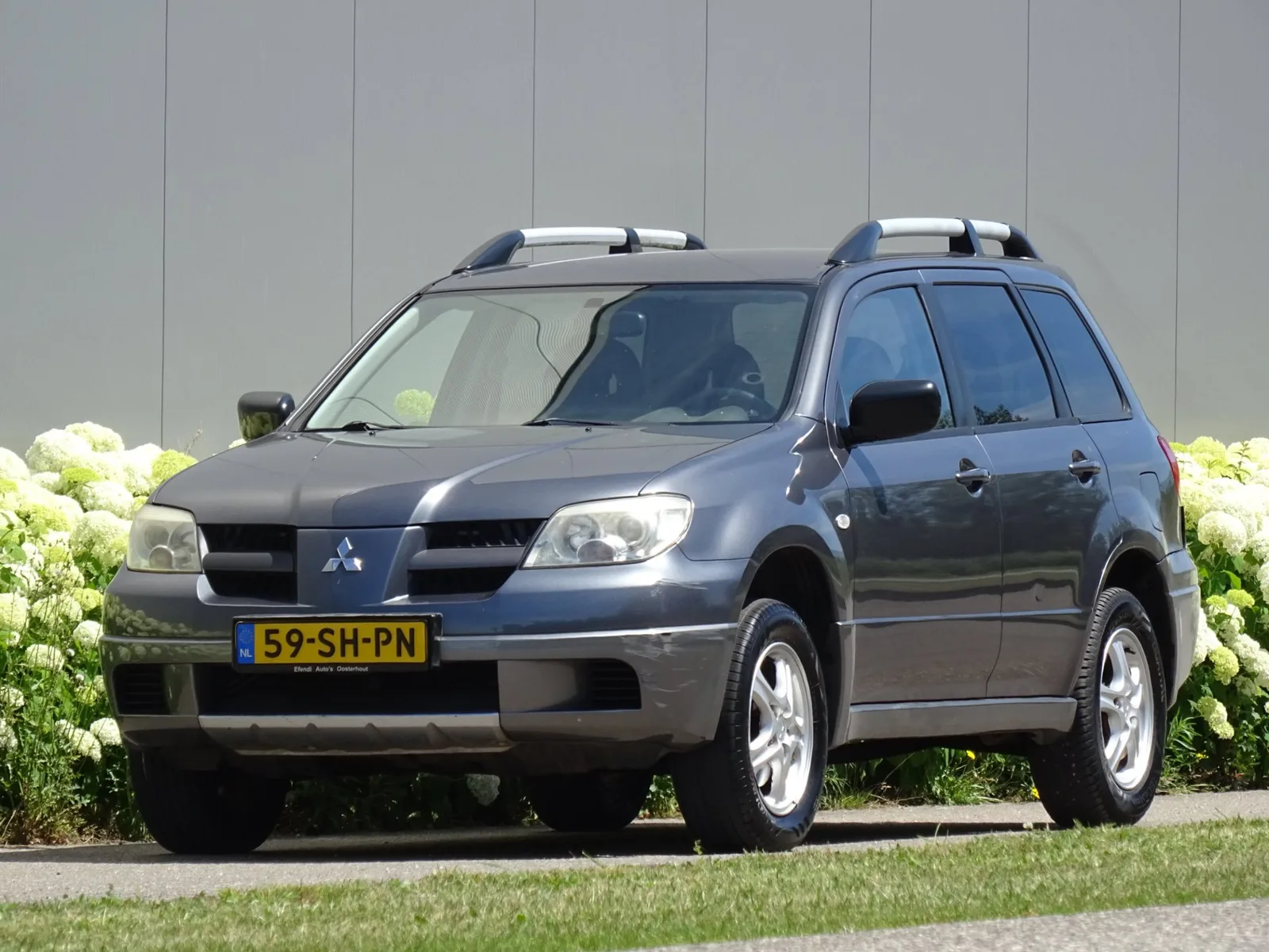 Mitsubishi Outlander (2006) — foto 1