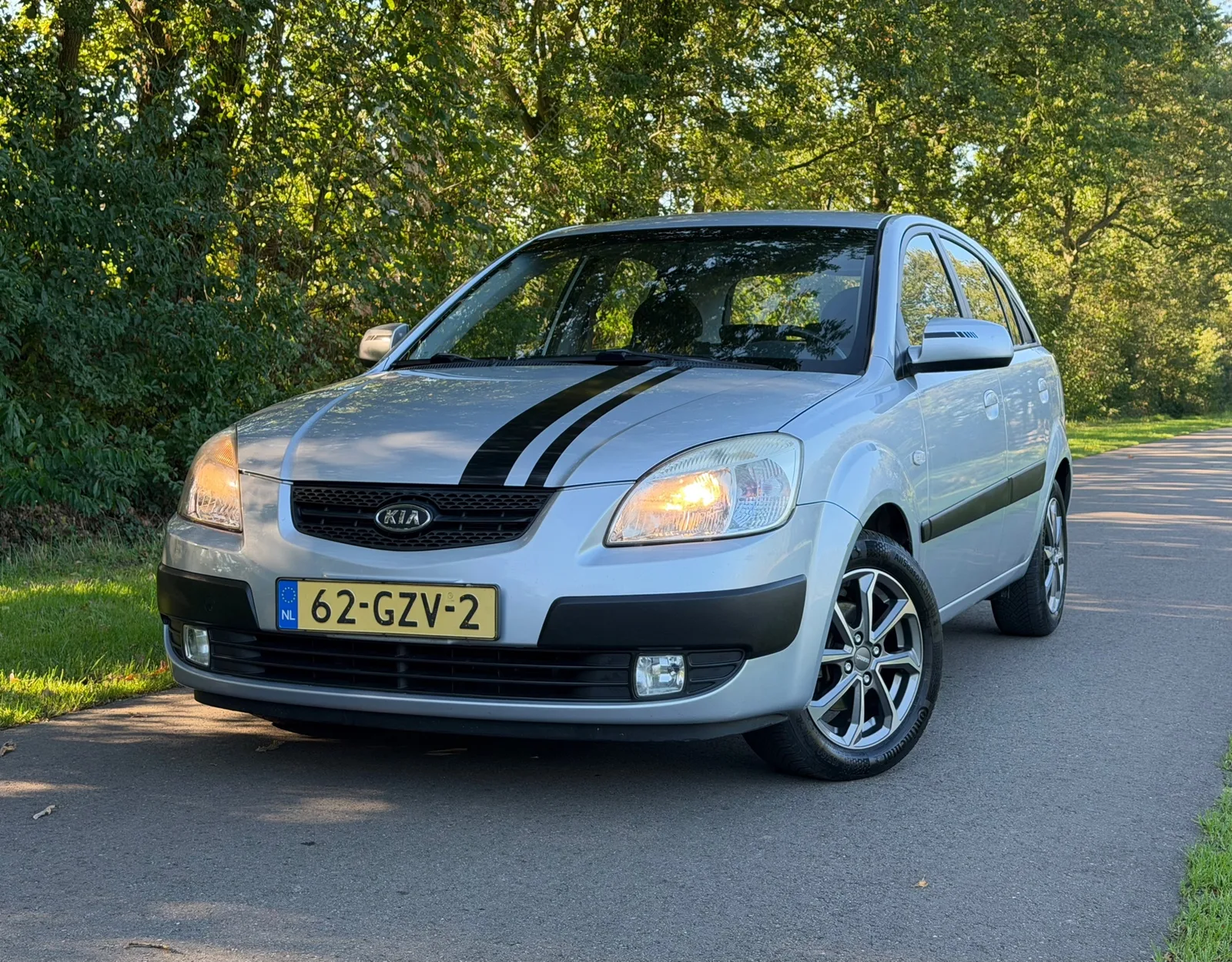 Kia Rio (2009) — foto 1