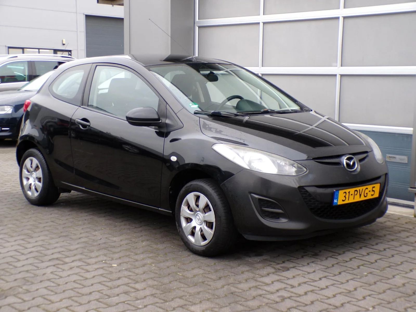 Mazda 2 (2011) — foto 1