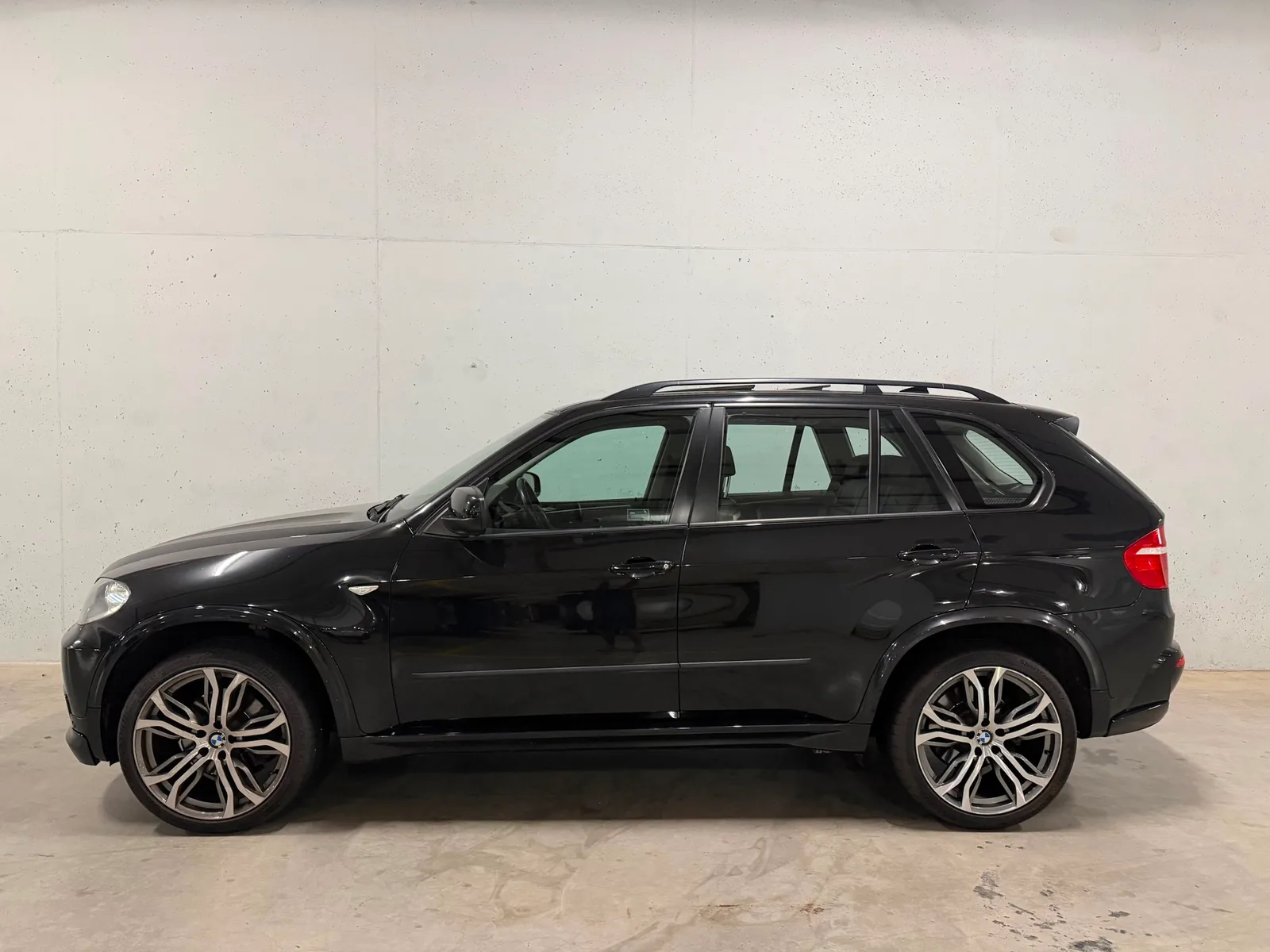 BMW X5 (2009) — foto 1