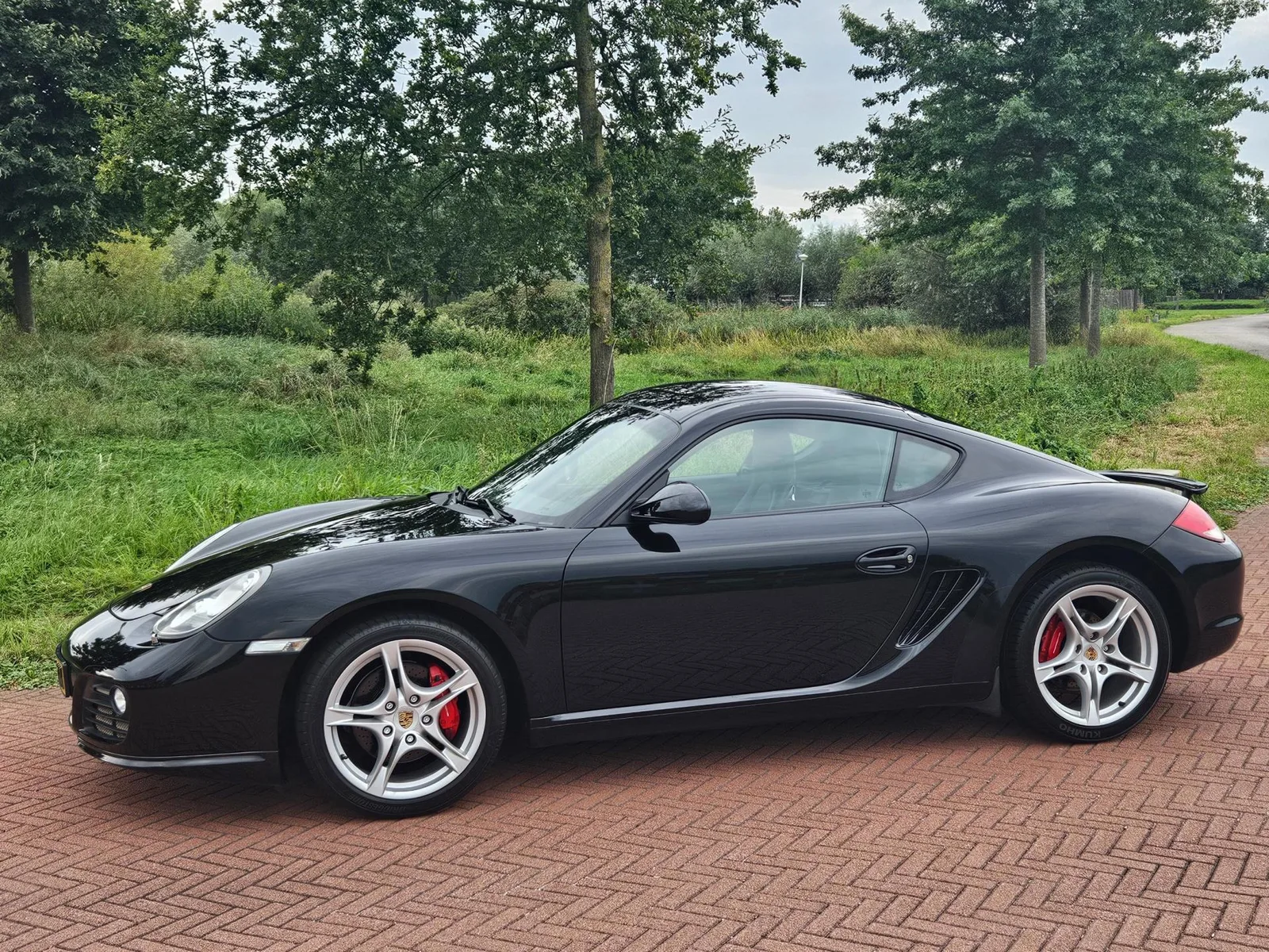 Porsche Cayman (2010) — foto 1