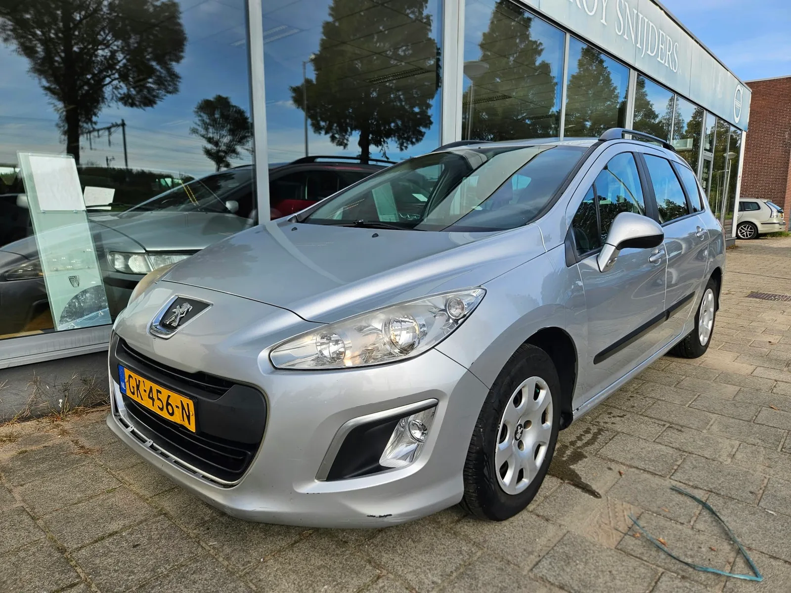 Peugeot 308 (2011) — foto 1