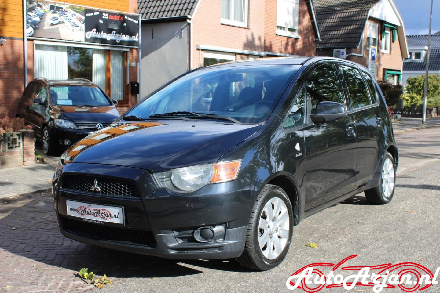 Mitsubishi Colt (2009) — foto 1