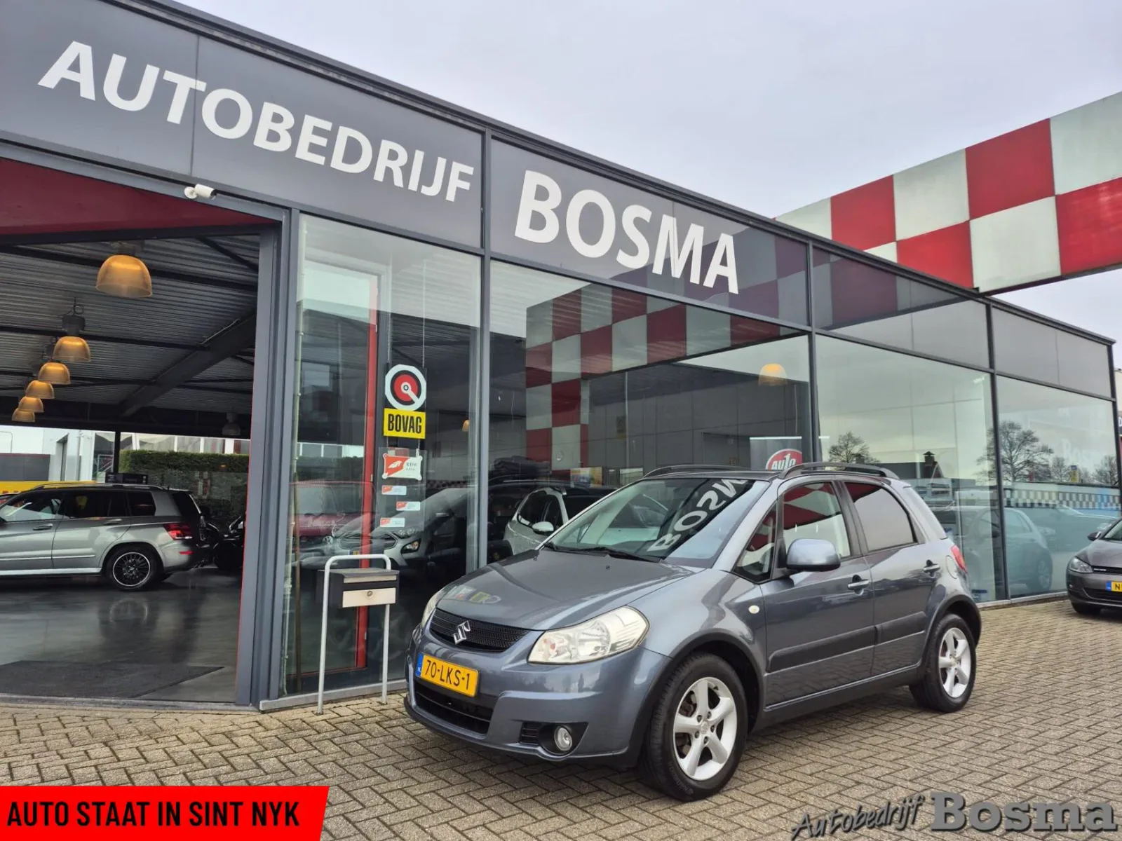 Suzuki SX4 (2010) — foto 1