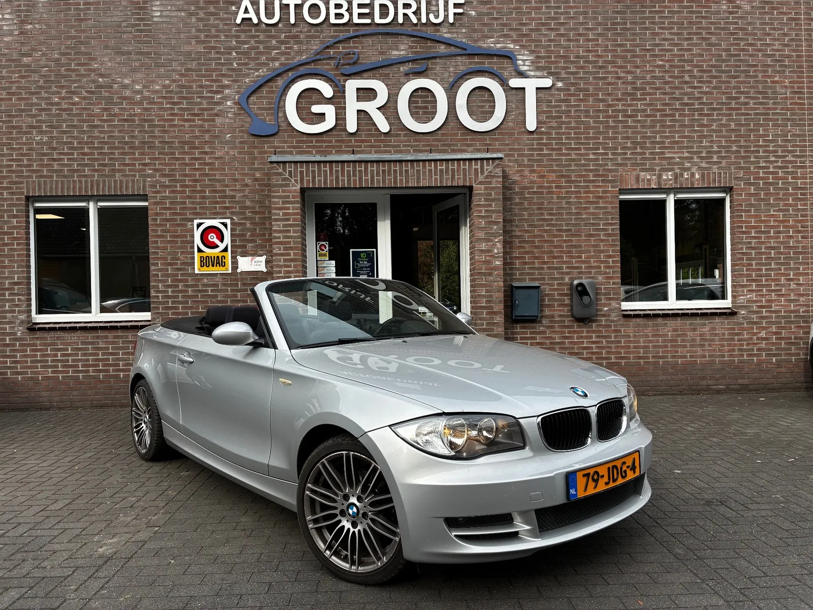 BMW 1-Serie (2009) — foto 1