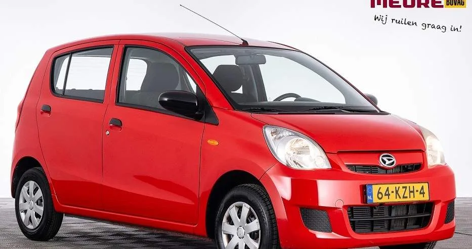 Daihatsu Cuore (2010) — foto 1