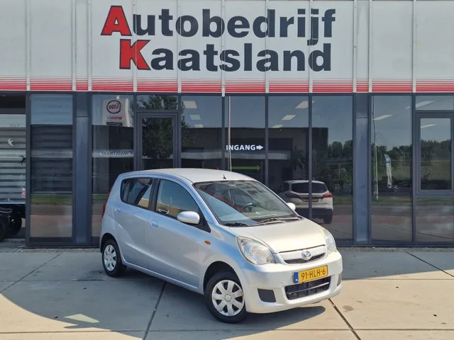 Daihatsu Cuore (2008) — foto 1