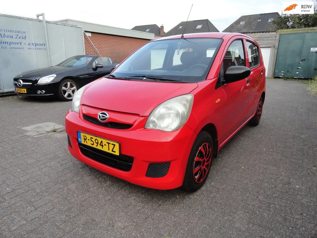 Daihatsu Cuore (2008) — foto 1