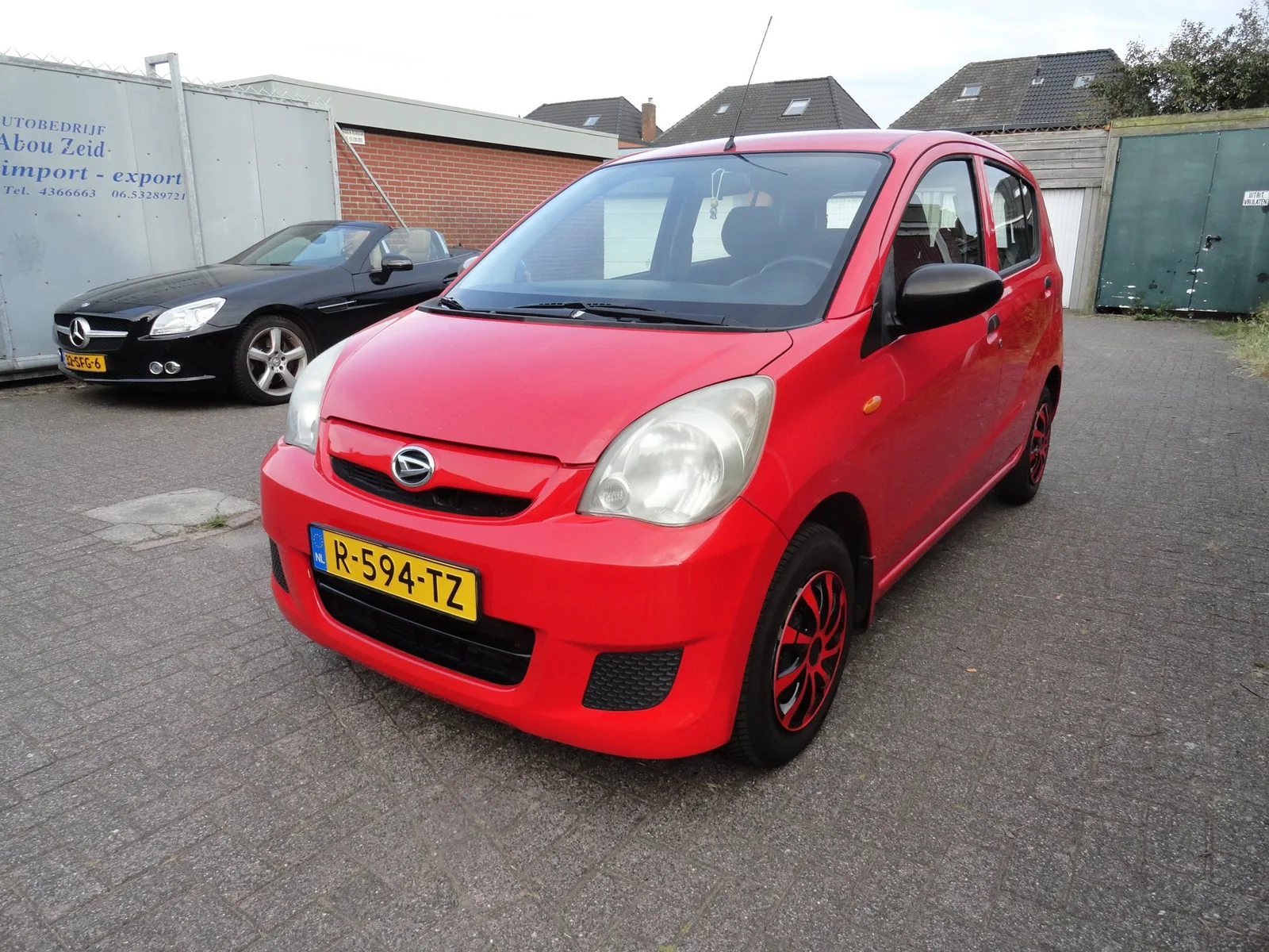 Daihatsu Cuore (2008) — foto 1