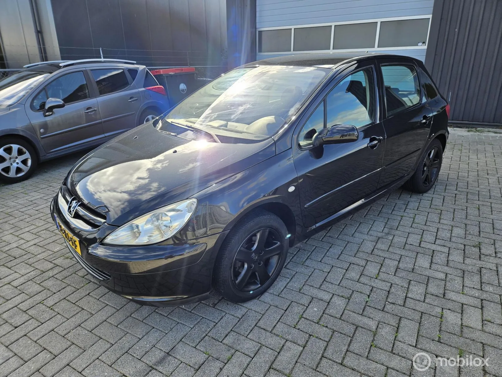 Peugeot 307 (2005) — foto 1