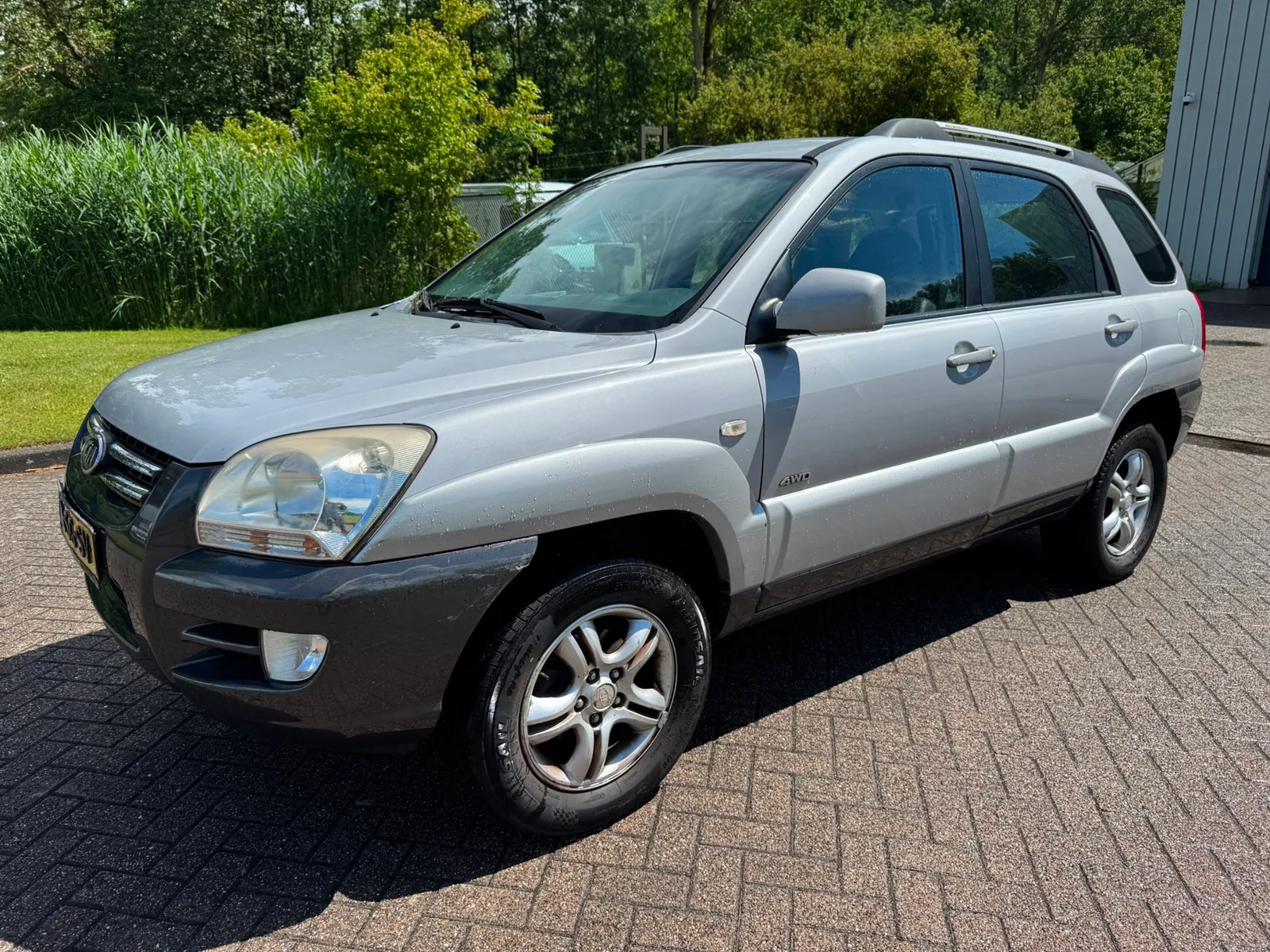 Kia Sportage (2006) — foto 1