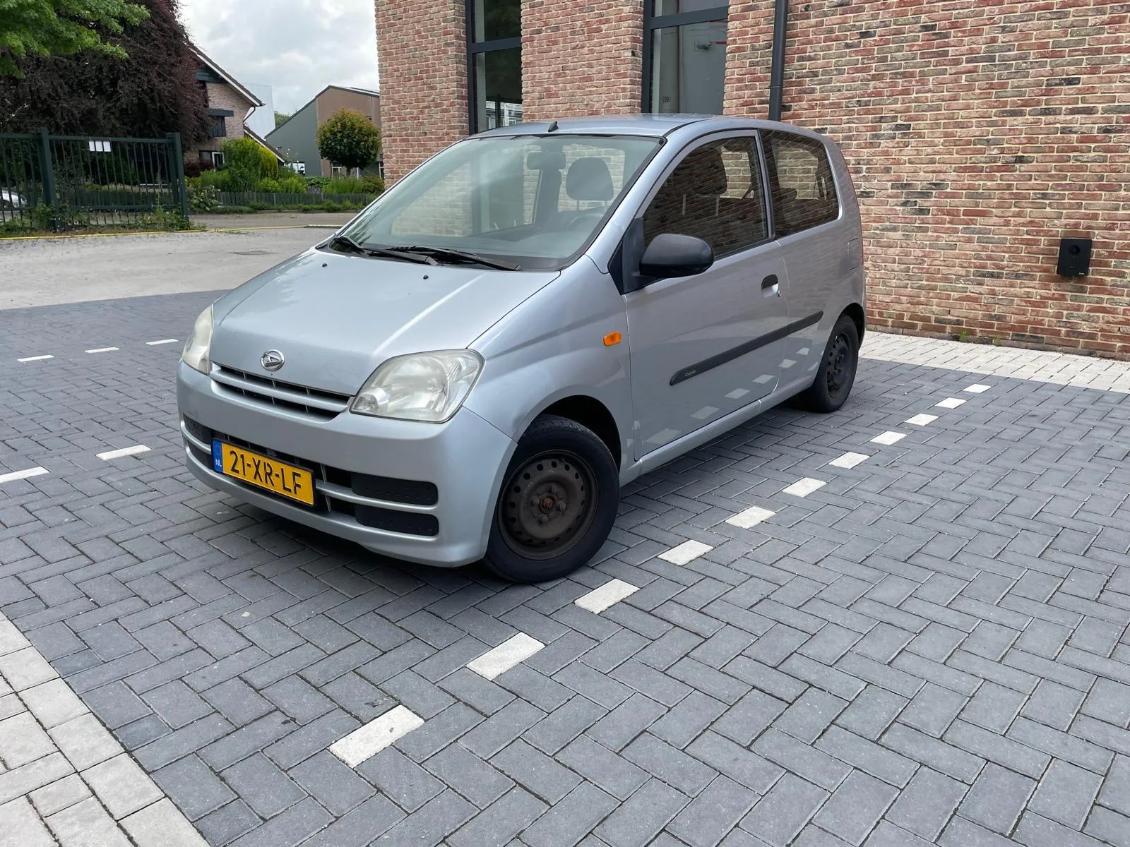 Daihatsu Cuore (2007) — foto 1