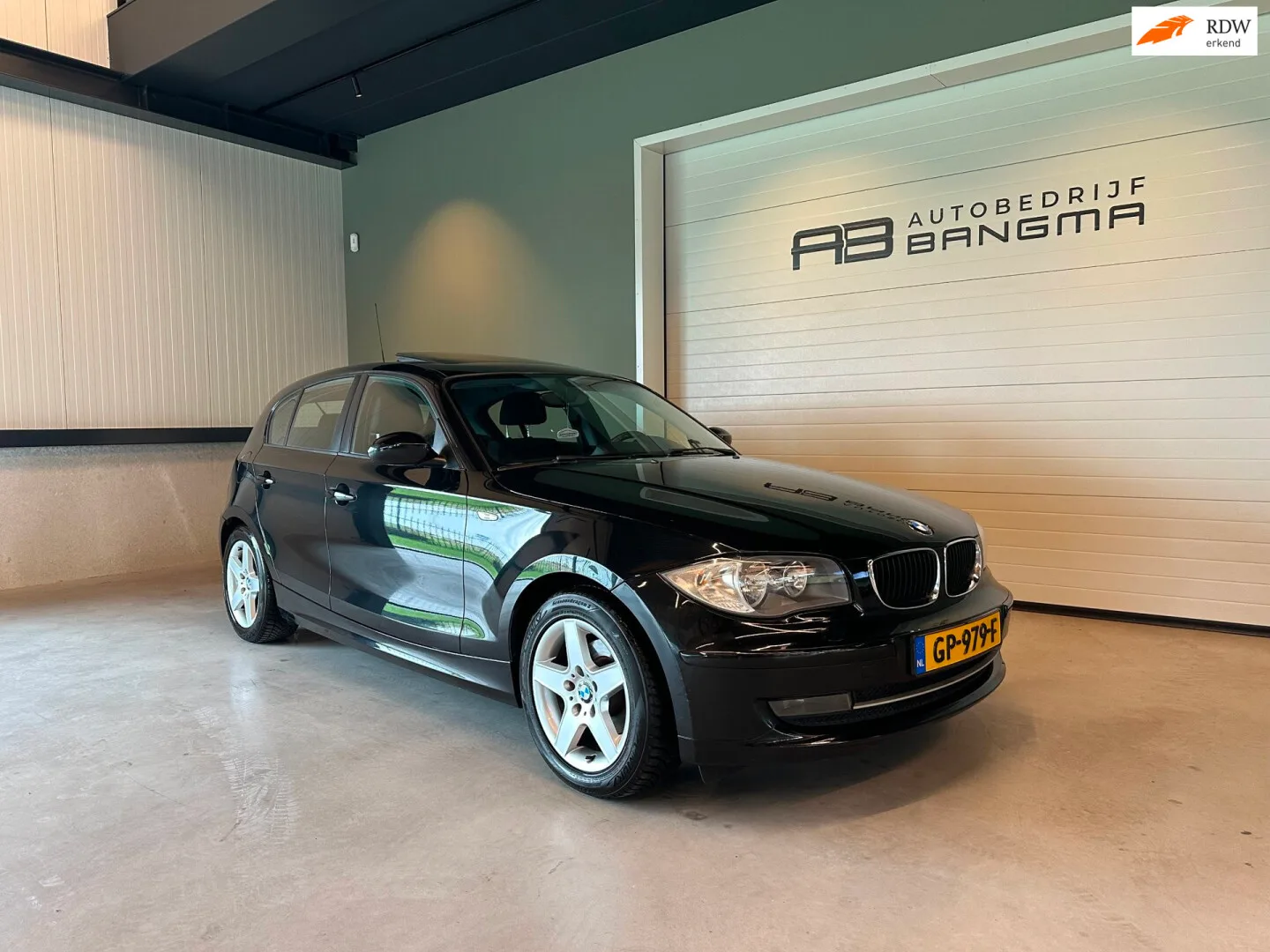 BMW 1-Serie (2009) — foto 1