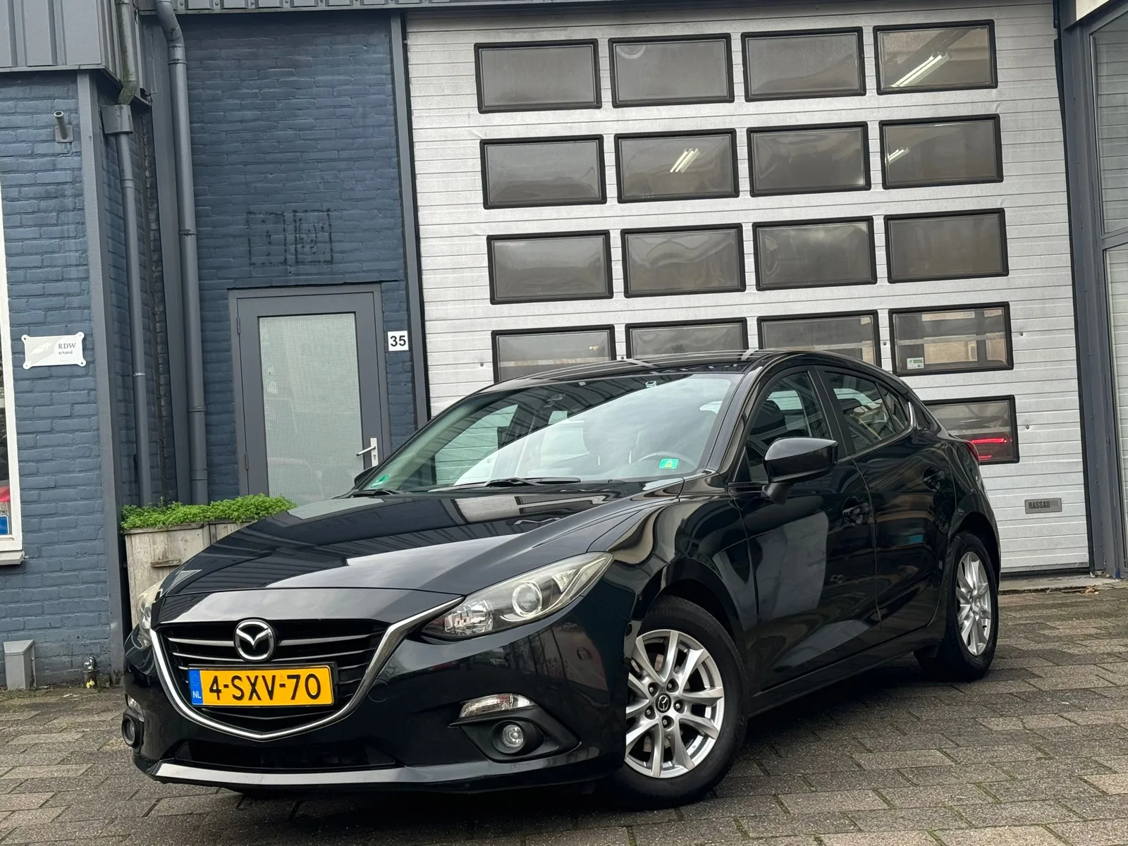 Mazda 3 (2014) — foto 1