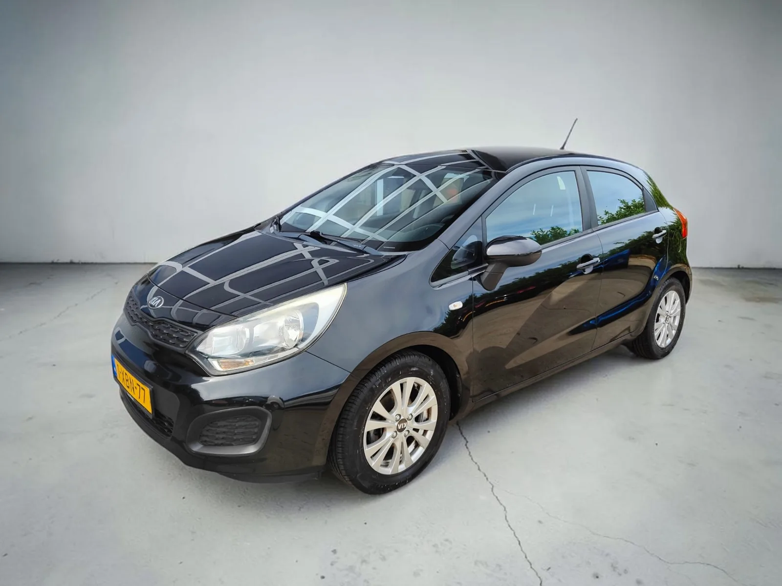 Kia Rio (2014) — foto 1