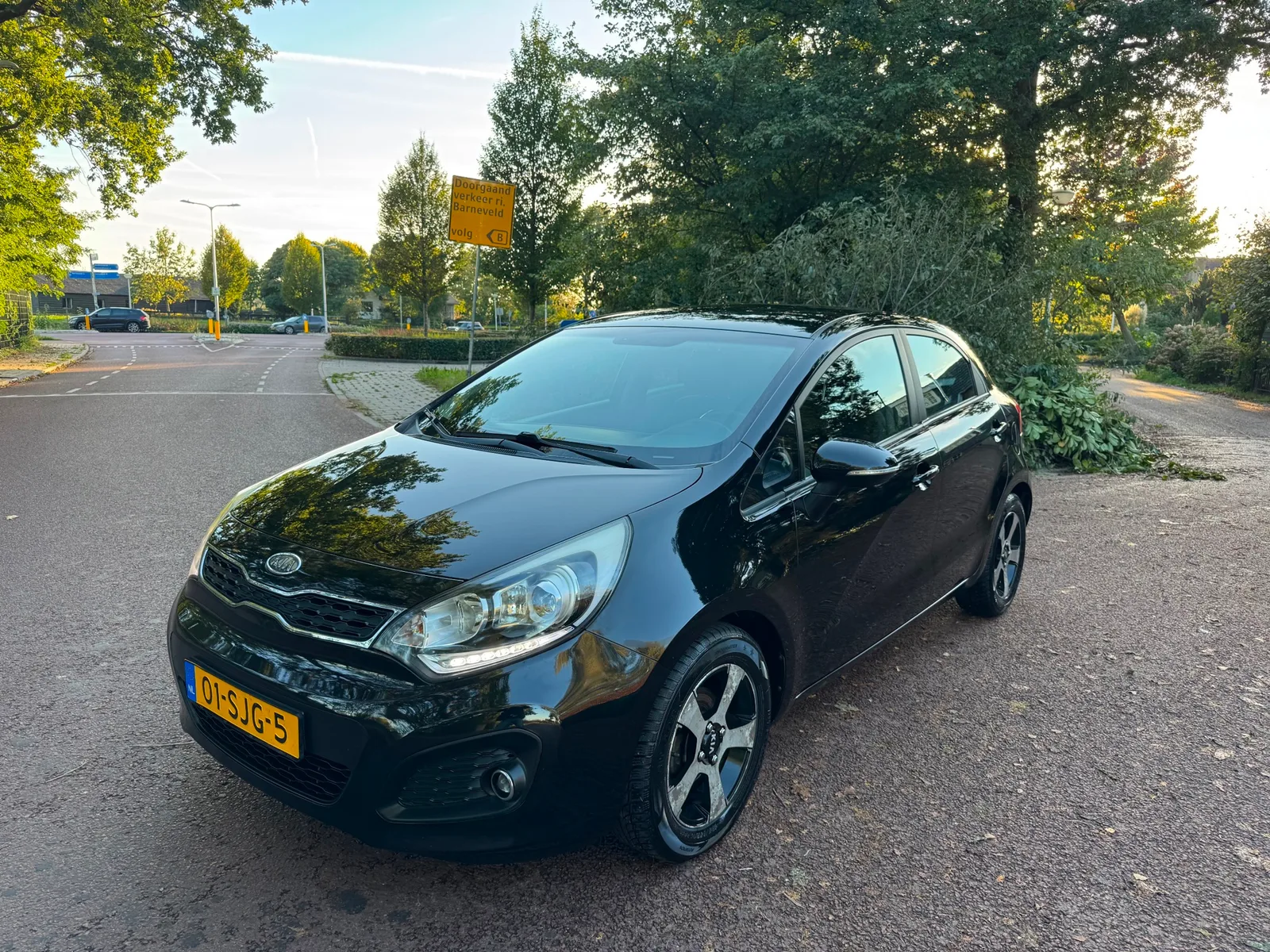 Kia Rio (2011) — foto 1