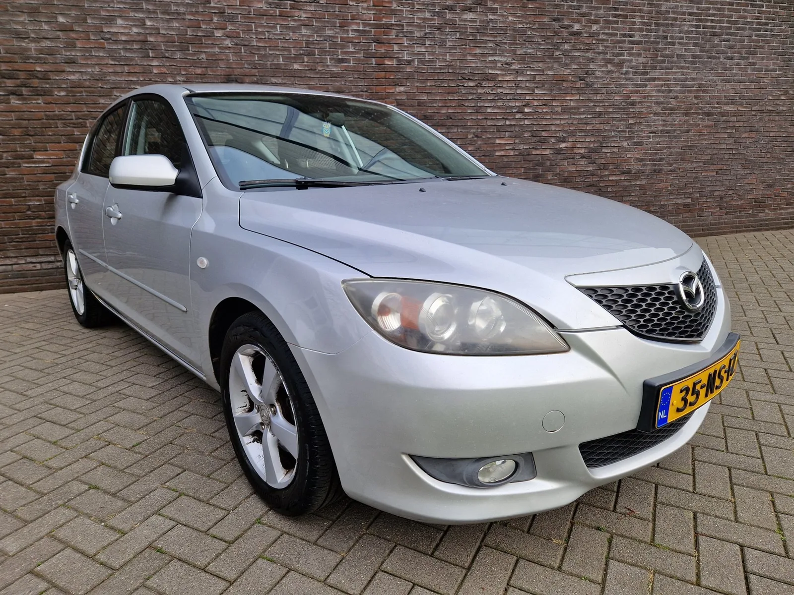 Mazda 3 (2004) — foto 1