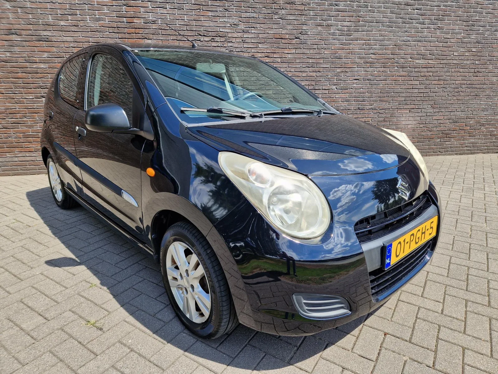 Suzuki Alto (2011) — foto 1
