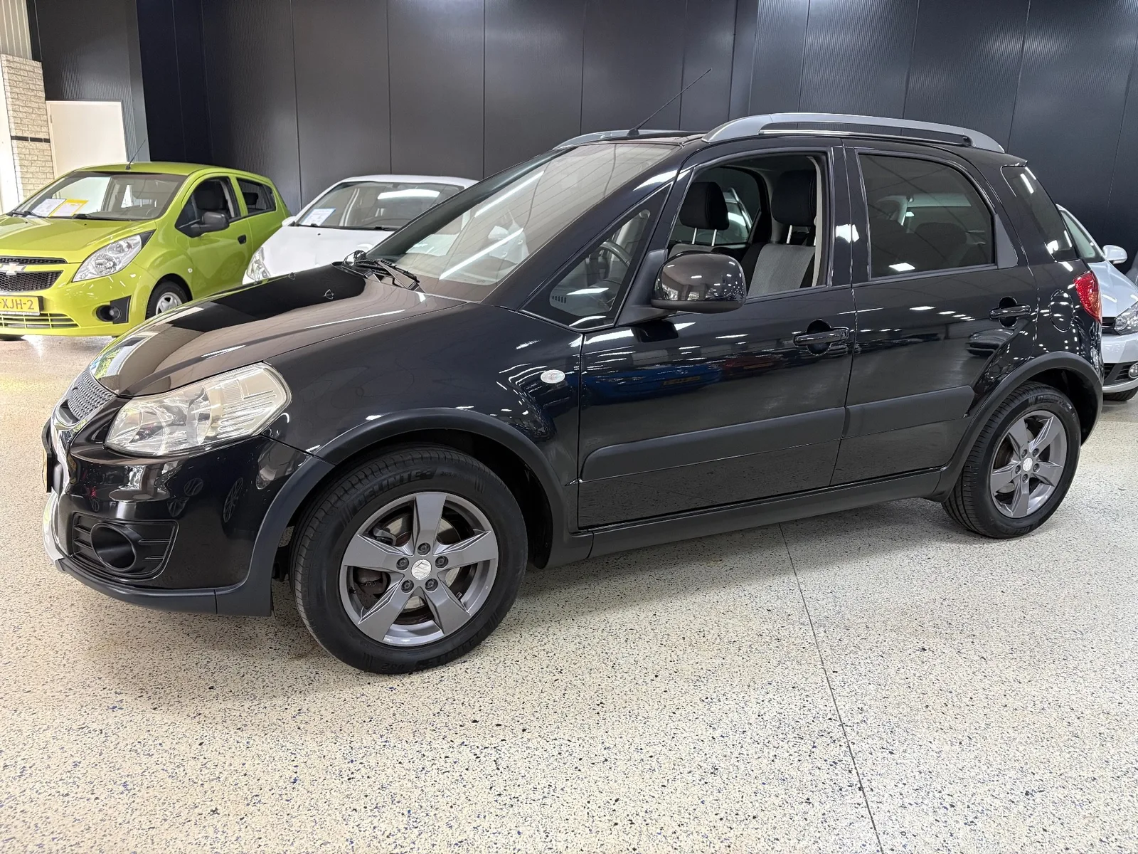 Suzuki SX4 (2011) — foto 1