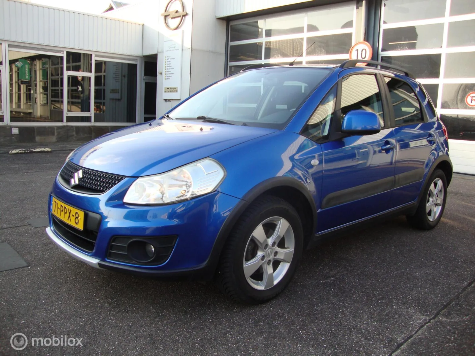 Suzuki SX4 (2011) — foto 1