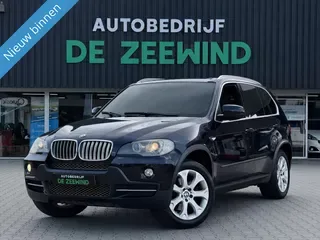 BMW X5 (2009) — foto 1