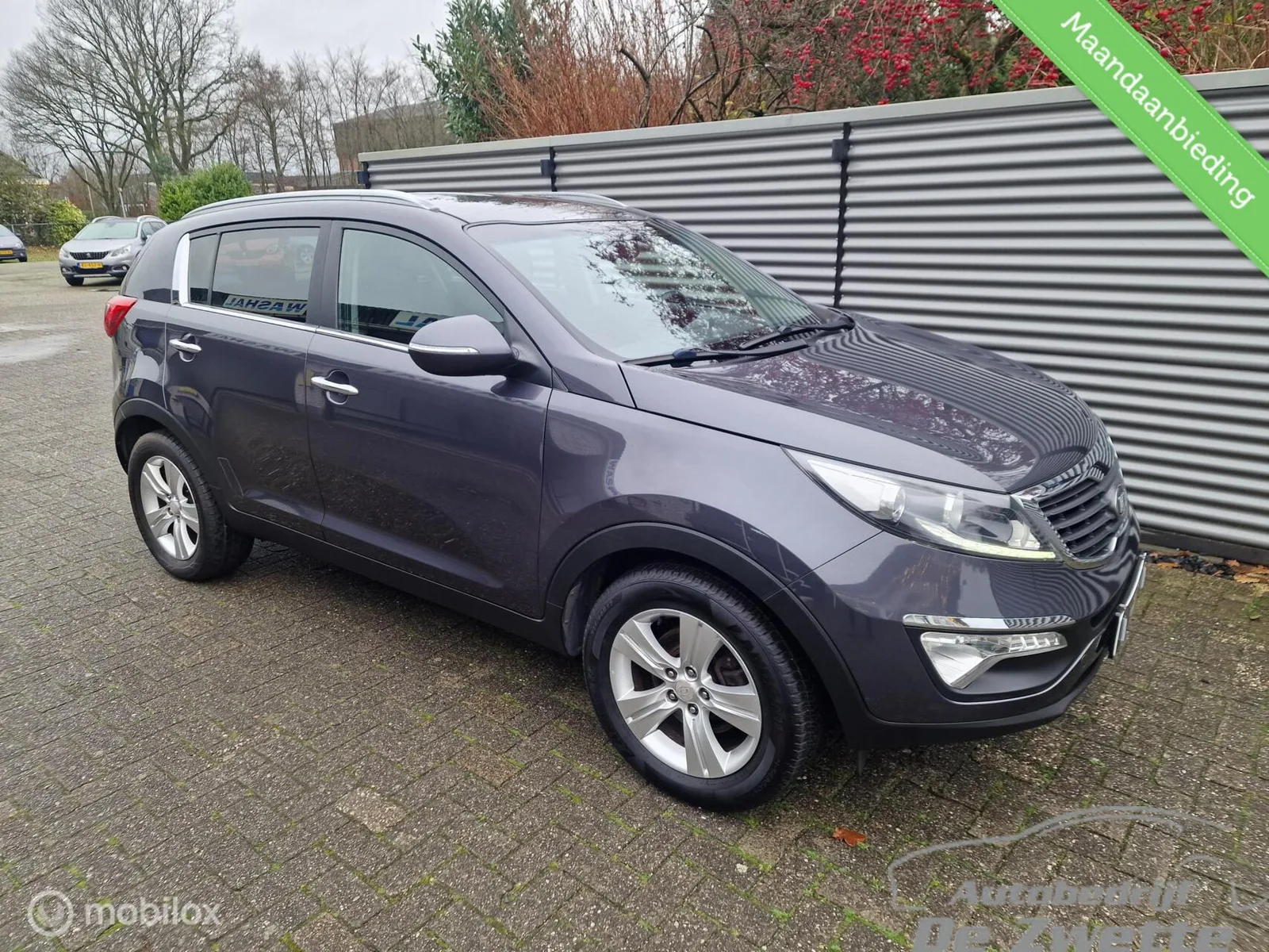 Kia Sportage (2013) — foto 1