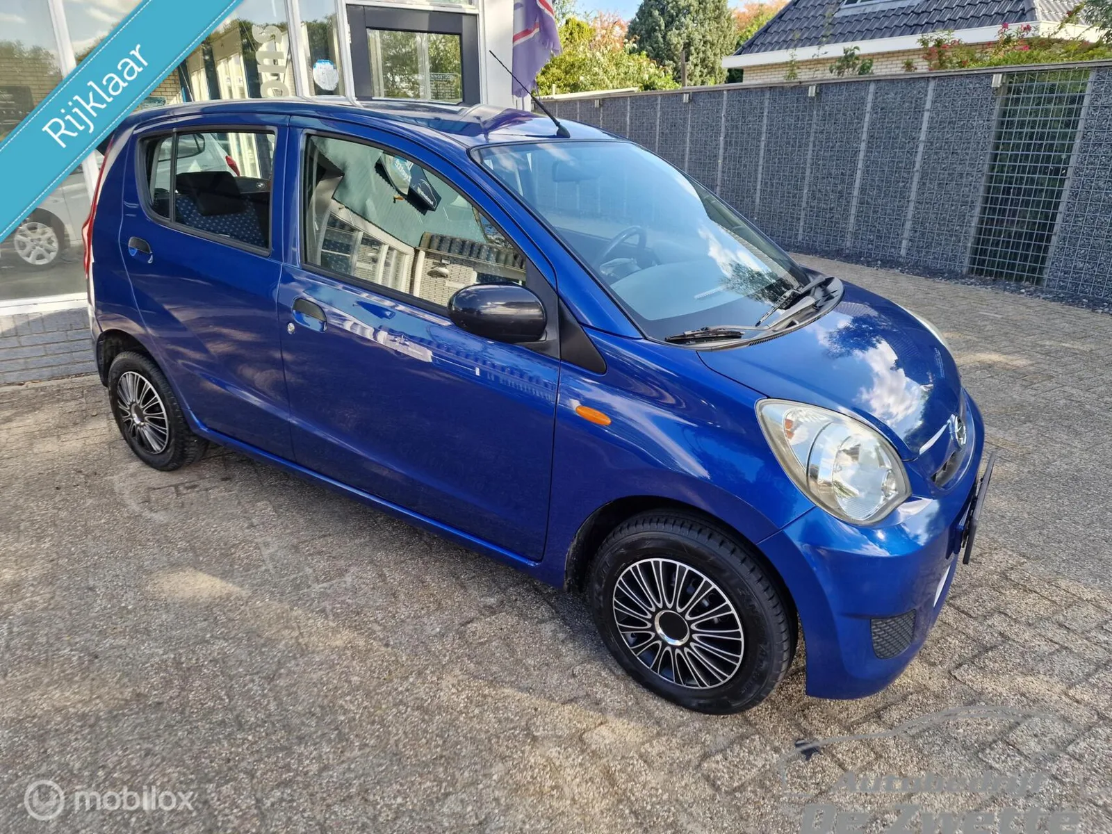 Daihatsu Cuore (2010) — foto 1