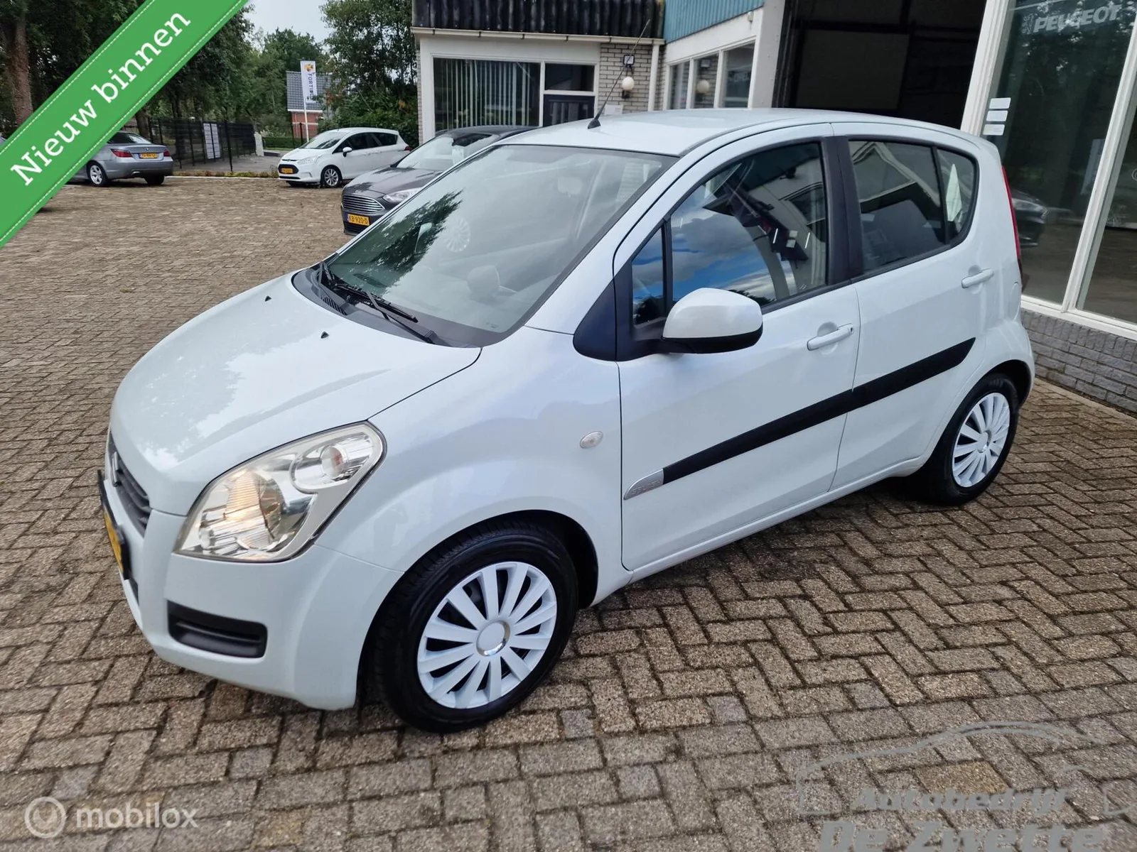 Suzuki Splash (2011) — foto 1