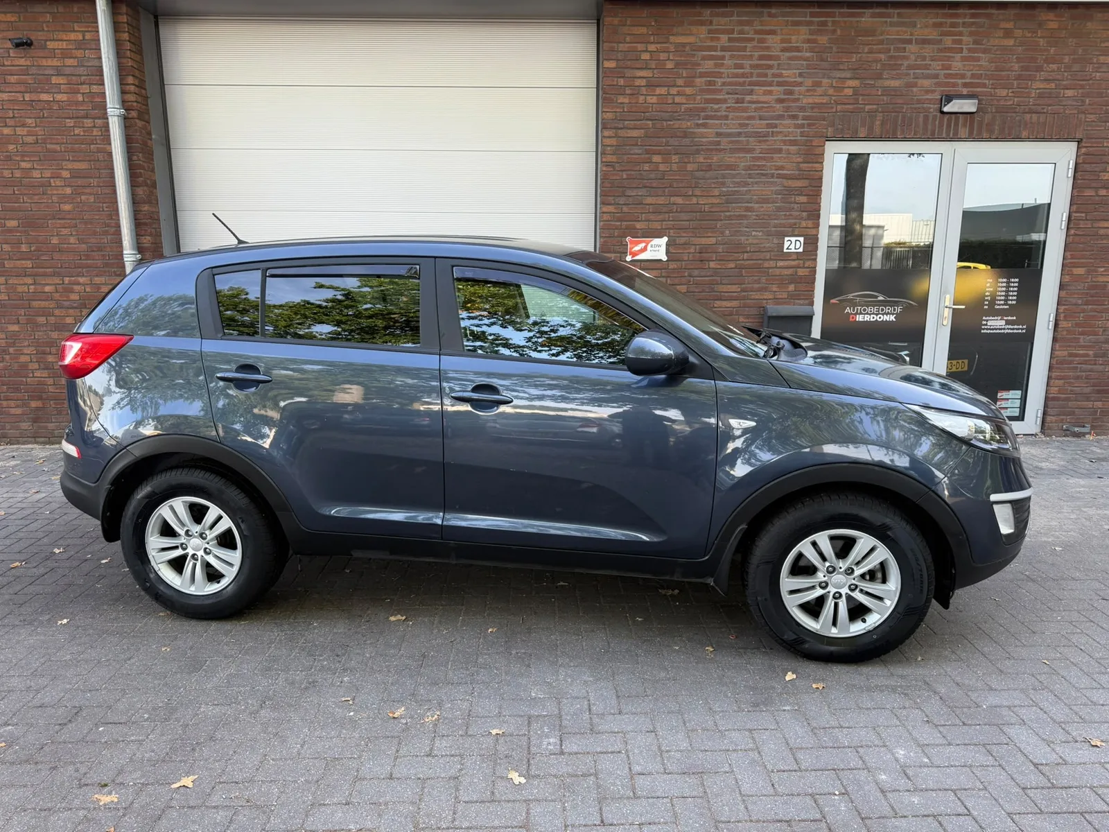 Kia Sportage (2012) — foto 1