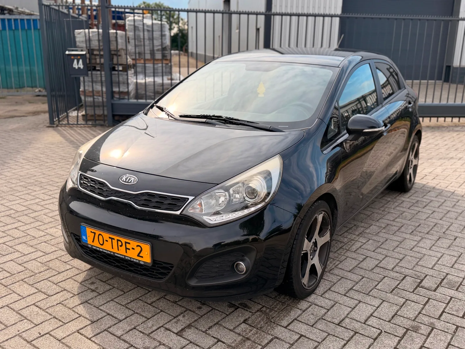 Kia Rio (2012) — foto 1